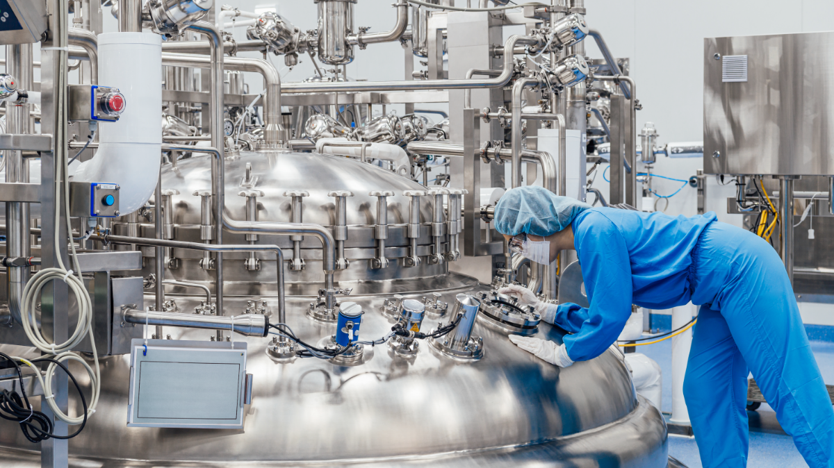 A production engineer inspecting the incubator facility.