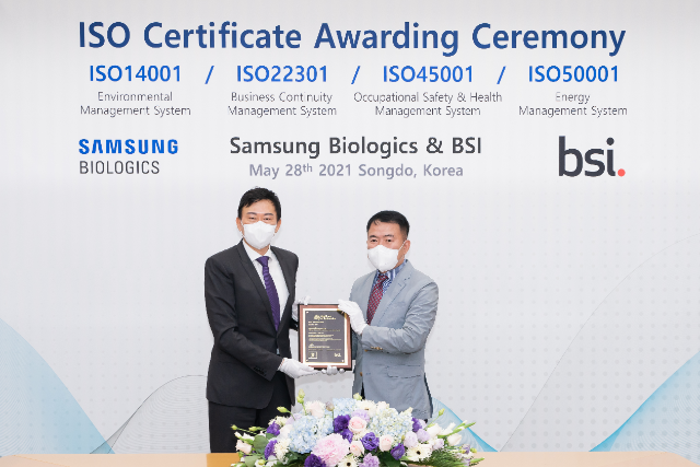 ISO Certificate Awarding Ceremony ISO14001(Environmental Managemert Sytem), ISO22301(Business Continutiy Vlanagement Sytem), ISO45001(Occupational Safety & Health Management Sytem), ISO50001(Energy Management System) Samsung Biologics & BSI May 28th 2021 Songdo, Korea 