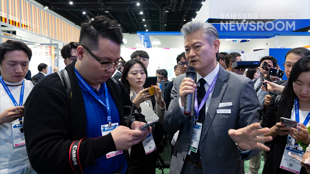James Choi, Executive Vice President and Head of Sales Support, gives booth tour